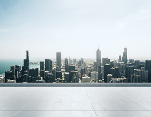 Empty concrete rooftop on the background of a beautiful Chicago city skyline at daytime, mock up