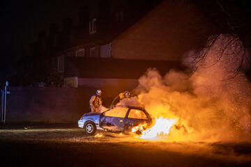 car on fire by night