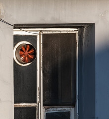 old window with dirty ventilator, air duct, built-in exhaust fan