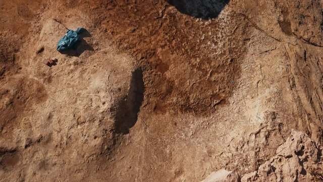 Bugibba Bay cliff and rocky shore. High angle shot. Mars like surface. High quality 4k footage