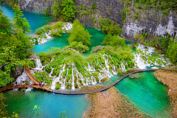 Aerial top view of Plitvice turquoise Lakes National Park outdoors in Croatia in the spring season 
