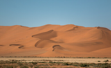 Fototapeta na wymiar sossusvlei dunes with moutains of sand 