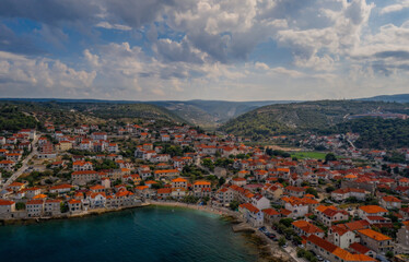 Aerial panoramic drone view on village Postira on Brac island, Croatia. August 2020