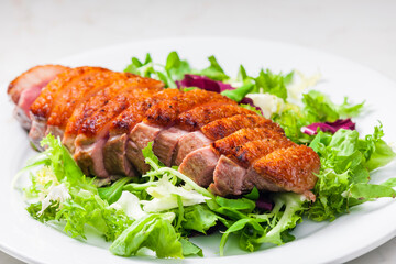 roasted duck breast with green salad