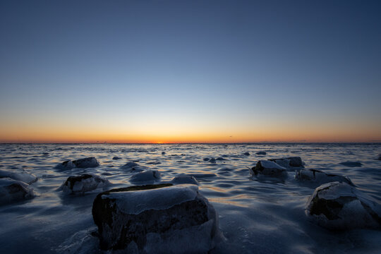 Nationalpark Wattenmeer im Winter, Eisschollen, Eis, Sonnenuntergang