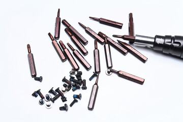 unscrewed the bolts using the screwdriver with various bits