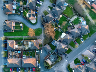 Aerial view of picturesque housing estate in Marchwood, Southampton in the United Kingdom. Image showing cars, houses, gardens and streets. - 434819444