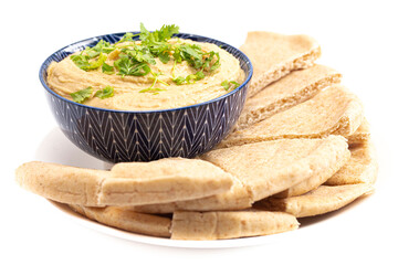 Bowl of Fresh Hummus on a White Background