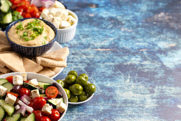 Fresh Greek Food on a Rustic Wooden Background