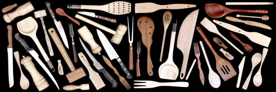Large Set Of Cookware Utensils Isolated On Black Background. Many Cookware Items on Black Table, Overhead View. Collection Of Different Kitchen Wooden Tools, Very Large Wide Background and.Pattern.