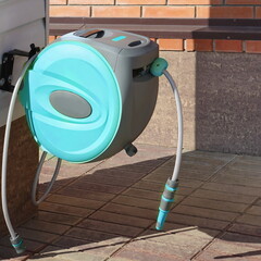 Garden Retractable Hose Reel with Sprinkler or Sprayer. Wall Mounted Retractable Hose Reel with...