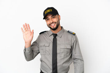Young arab man isolated on white background saluting with hand with happy expression