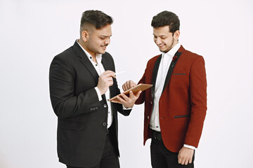 Two men in official costumes discussing something isolated