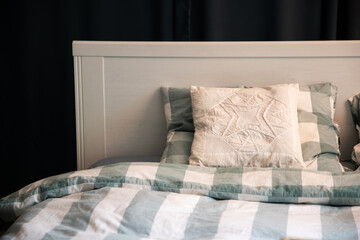 cozy bedroom detail with night lamp