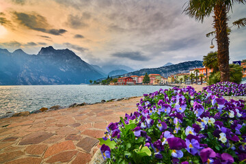 View of the beautiful Lake Garda in the springtime,Torbole city surrounded by mountains in Trentino...