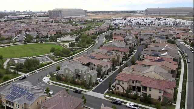 Tustin home community of houses in California. Aerial view