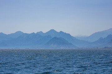 View of the mediterranean sea against the backdrop of high taurus mountains