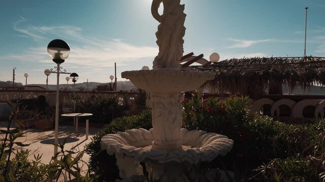 Beautiful mermaid Statue in an abandoned restaurant garden in Bugibba Malta. High quality 4k footage