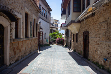 Fototapeta na wymiar Antalya, Turkey 05.20.2021: Streets in the center of the old city of Antalya in Turkey uncrowded