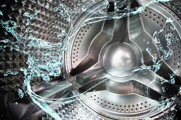 Water splash inside the washing machine's tumble.