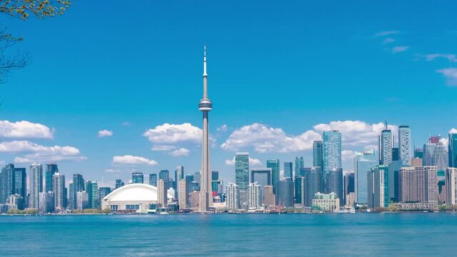 4K timelapse of daytime view of Toronto skyline and Lake Ontario during spring summer as seen from Toronto island,Toronto, Ontario Canada