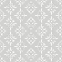 Fototapeta premium Decorative background pattern with floral white ornament on a gray background, retro style wallpaper. Seamless pattern, texture. Vector image