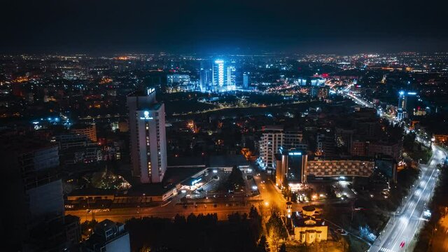 Drone footage of Grand Hotel Millennium Sofia  during night Time Lapse. Hyper Lapse