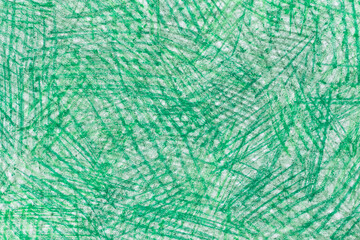green abstract crayon drawing on white paper