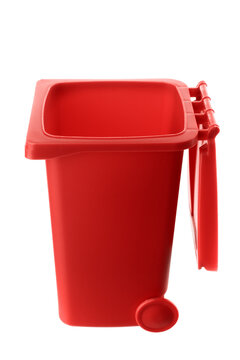 Plastic red trash can isolated on white background