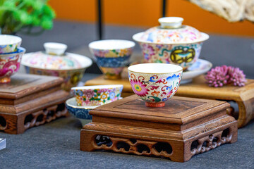 Chinese style painted teapots, cups and various tea sets