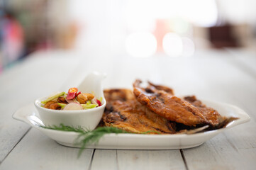 Deep fried Fish and green mango salad
