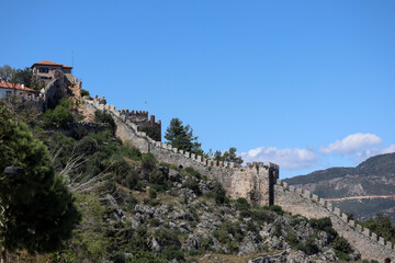 medieval wall and towers of Alanya fortress in Turkey