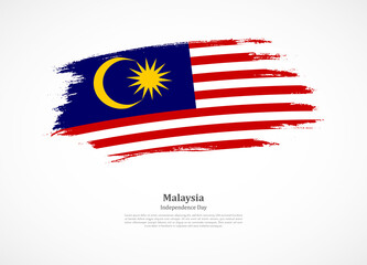 Happy independence day of Malaysia with national flag on grunge texture