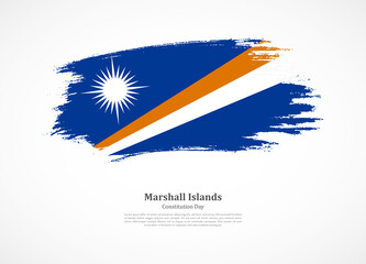 Happy constitution day of Marshall Islands with national flag on grunge texture