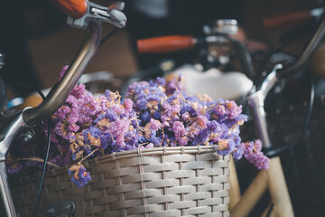 Bicycle with a basket of flower