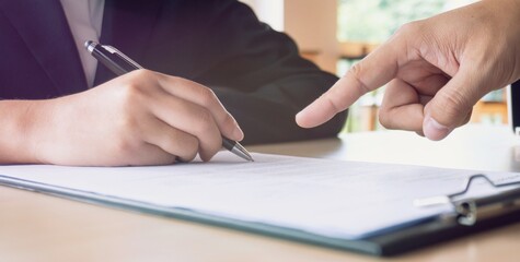 Man Completing Application Form during job interview. human resources concept.