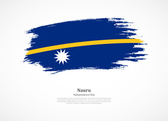 Happy independence day of Nauru with national flag on grunge texture