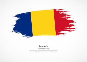 Happy independence day of Romania with national flag on grunge texture