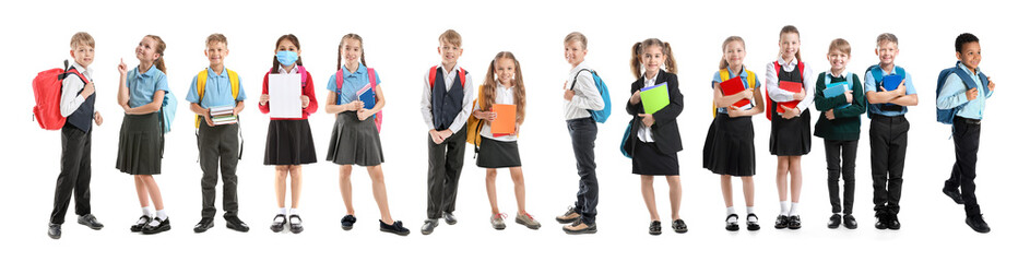 Obraz premium Cute little schoolgirl on white background