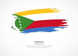 Happy independence day of Comoros with national flag on grunge texture
