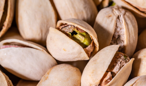 Close-up of pistachio. Selective focus on foreground.Pistachios texture. Nuts.