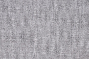 Fototapeta na wymiar natural linen gray-dyed fabric texture background