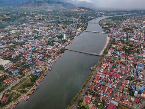Stunning shots by drone from Kampot city in south of Cambodia, amazing old architecture struggling with the actual world