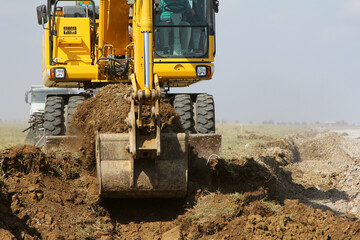 Crawler excavator working on a runway construction site