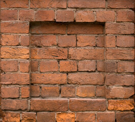 Red brick square frame. Old wall.