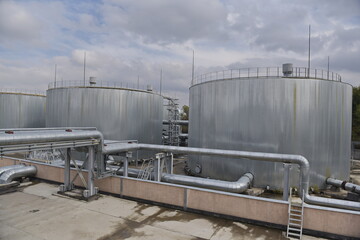 Obraz premium Almaty, Kazakhstan - 10.23.2015 : Pipes and fuel tanks for urban thermal power plant operation