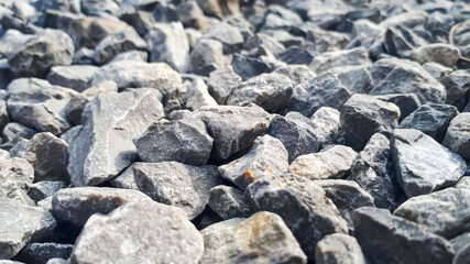 Gravel road texture. Small grey pebble patternt. Stone ground