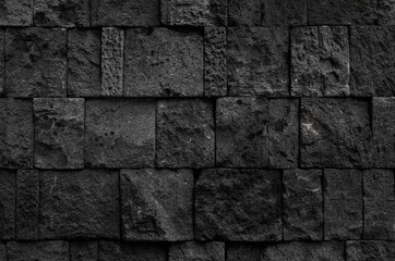black granite block wall texture, building exterior or interior background