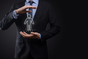 Businessman holds man person icon on dark tone background.HR Human ,people iconTechnology Process...