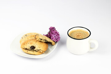 Hot black coffee with foam and sweet chocolate cookies on white background. Part of set.